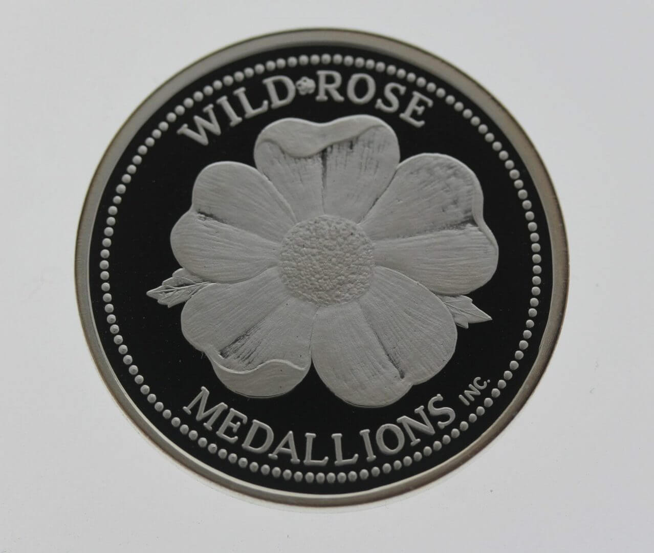 236906-you-dream-we-create-12oz-999-silver-round-wild-rose-medallions